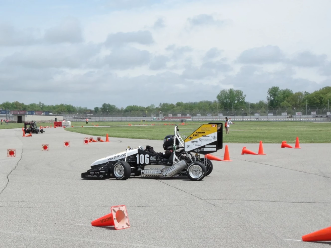University of Waterloo Formula SAE Motorsports Race Car on Racetrack
